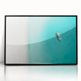 Large abstract wall art depicting Caribbean scenery in muted blue and green tones on a framed acrylic.