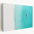 A large canvas print depicting a serene Caribbean beach with blue and turquoise waters, ideal for kitchen wall art.