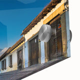 Large abstract wall art in vibrant hues depicting Central American scenery on acrylic glass, ideal for dining room ambiance.