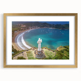 Extra large abstract art print of Central America scenery in muted earth tones on a textured canvas, framed in gold.