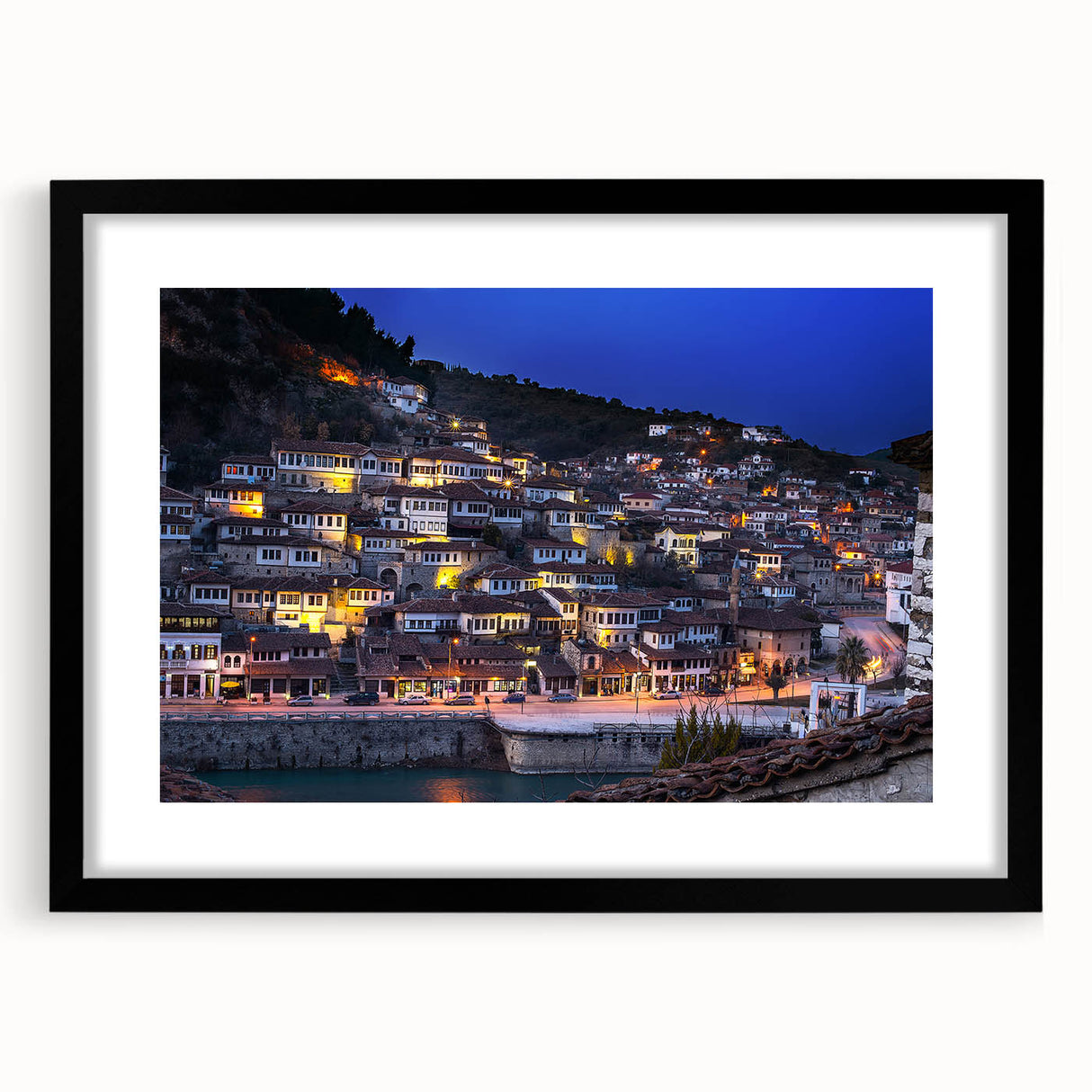 Extra large abstract art print featuring a colorful, textured depiction of a European scenery on a framed black mat.