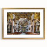 Abstract art print of a European landscape in muted earth tones, framed in gold, suitable for dining room decor.
