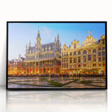 Large abstract wall art featuring a mid-century modernist European cityscape in muted earth tones on a framed acrylic panel.