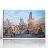 Mid-century modernist art depicting Prague skyline in muted earth tones on a white framed acrylic.