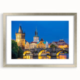 Extra large abstract art print of a European cityscape in muted gray tones, framed in silver, suitable for living room decor.