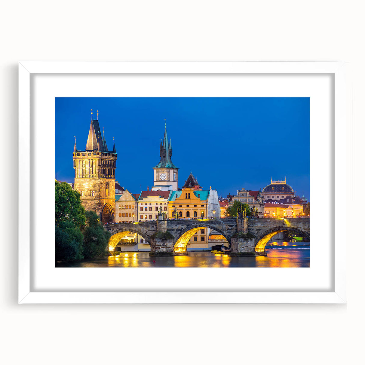Textured art depicting an abstract European cityscape in muted gray and blue tones on a framed white mat.