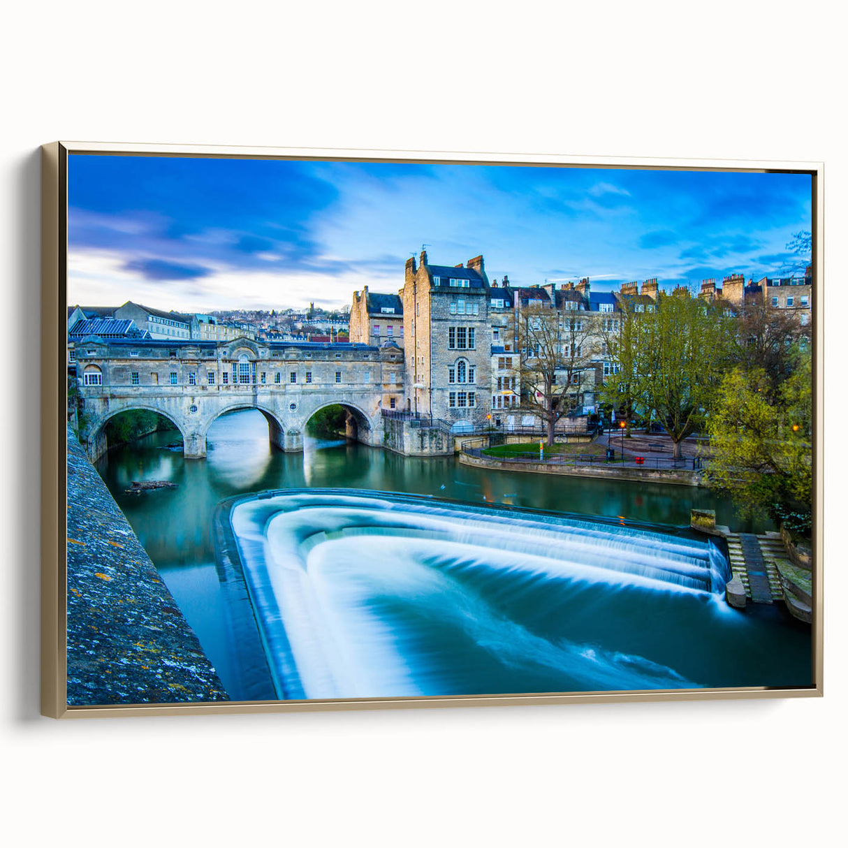 Framed canvas featuring a vintage-style landscape painting of Bath, England, in muted gold and black tones.