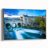 Landscape art painting of Bath, England in colorful and vintage poster style on a silver-framed canvas.