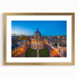 Abstract art print of Oxford scenery in muted earth tones on a framed canvas, suitable for dining room decor.