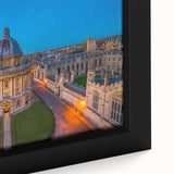 Close-up of textured black wall art depicting Oxford scenery in vibrant colors on a framed canvas.
