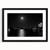 Extra large abstract print of the Thames River, featuring vibrant colorful art in a black frame, ideal for living room decor.