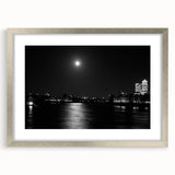 Extra large abstract art print of the Thames River, in muted blues and grays, framed with a silver mat.