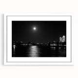 Textured art depicting an abstract Thames River scene in muted blue and gray tones on a framed white mat.