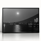 Large abstract wall art of the Thames River in muted gray and blue tones, framed in black acrylic.