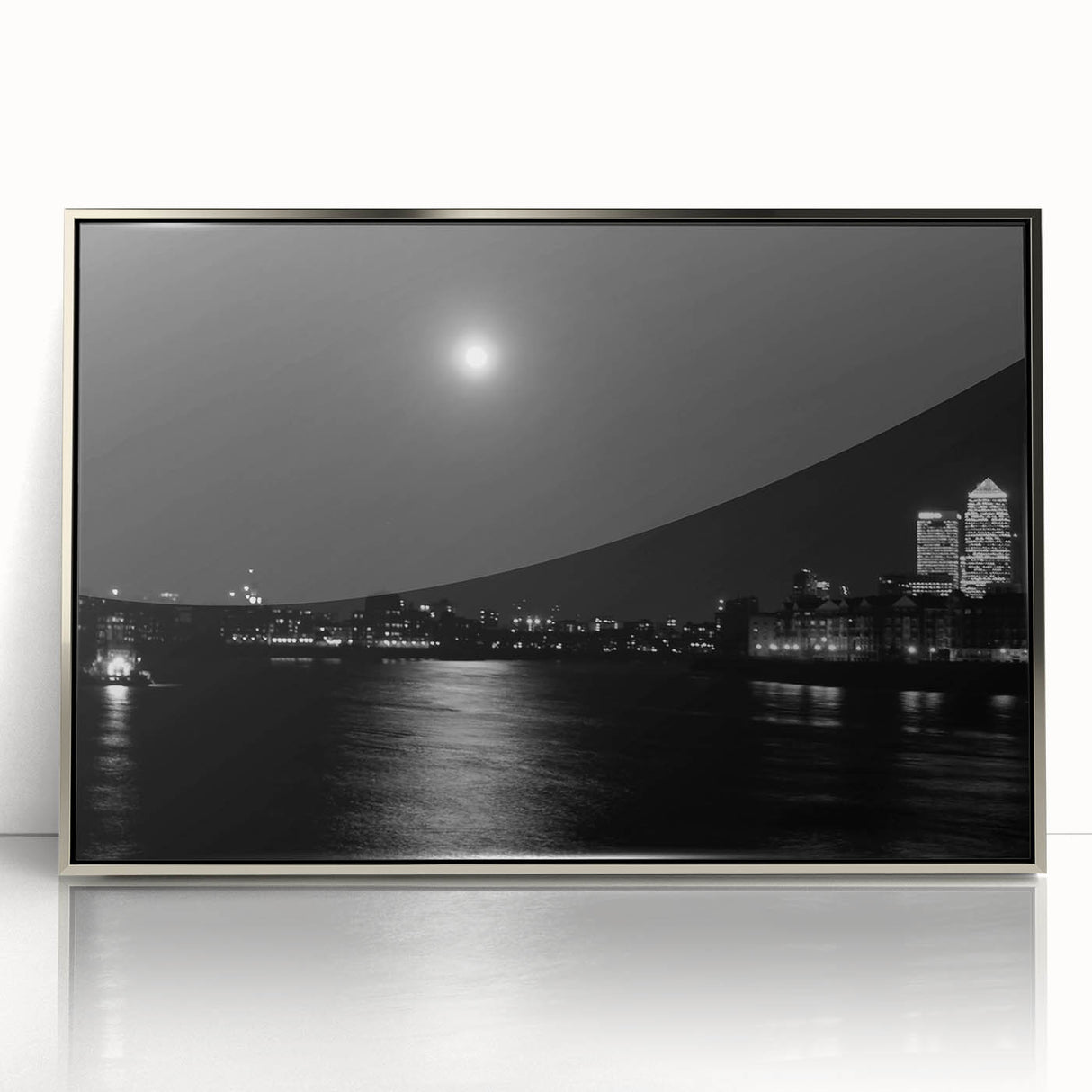 Large art print of the Thames River, featuring muted blue and gray tones on a framed acrylic.
