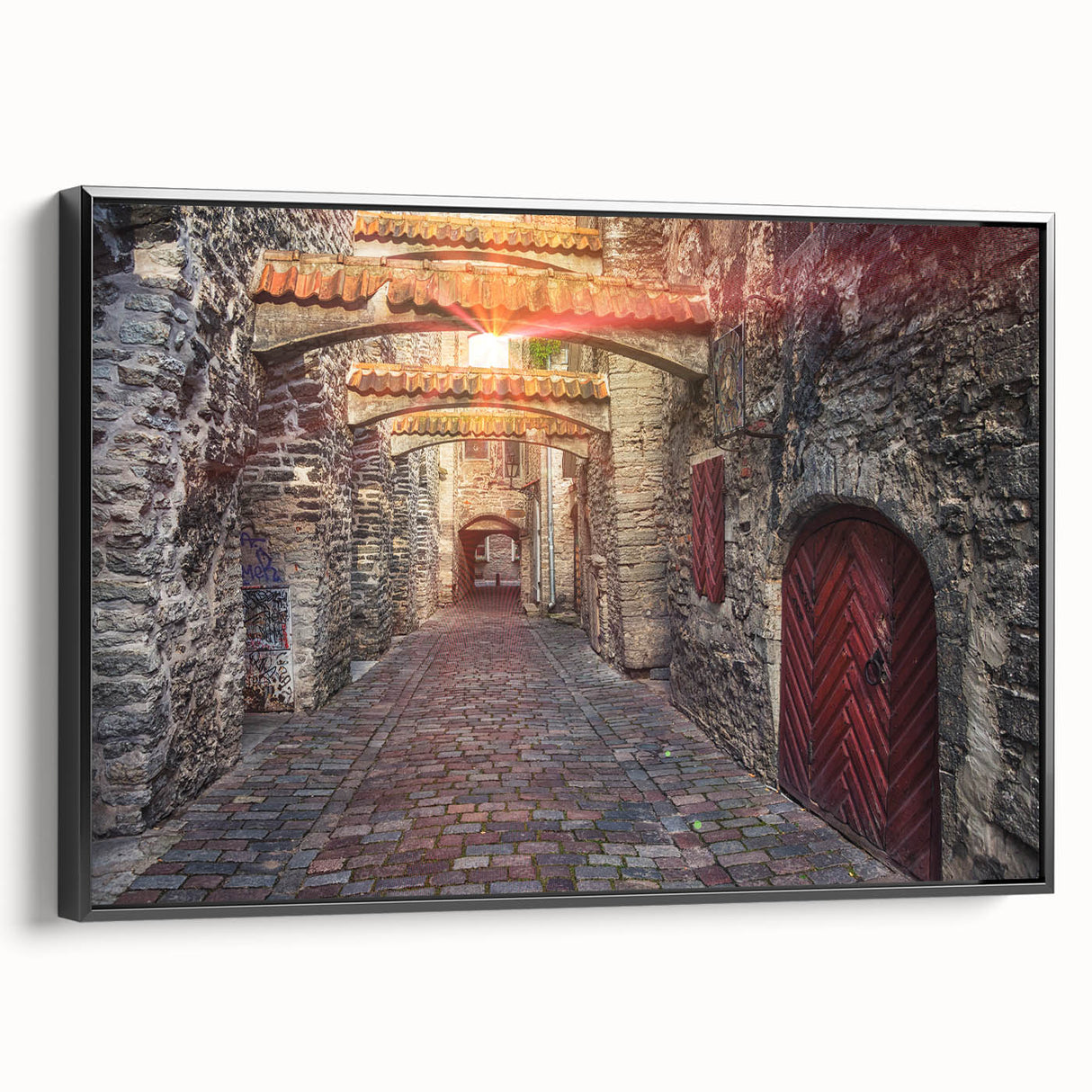 Black and white framed canvas depicting a vintage European landscape, ideal for bedroom wall art.