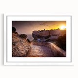Textured abstract art print of Corsican scenery in muted earth tones on a framed white mat, ideal for bedroom wall decor.