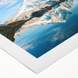 Art deco poster of the French Alps in muted earth tones on rolled canvas, suitable for dining room decor.