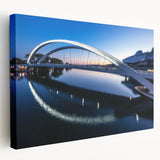 Side view of a stretched canvas depicting a scenic Lyon cityscape in subdued colors, suitable for kitchen wall art.
