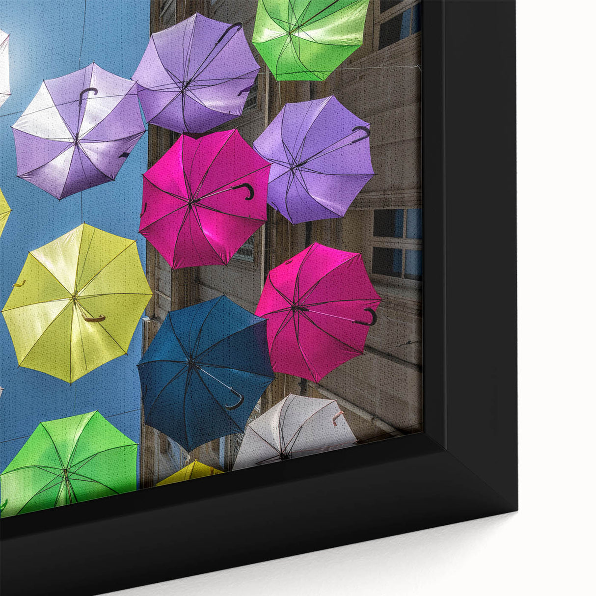 Extra large framed canvas featuring a textured depiction of a scenic French village in vibrant, colorful art.