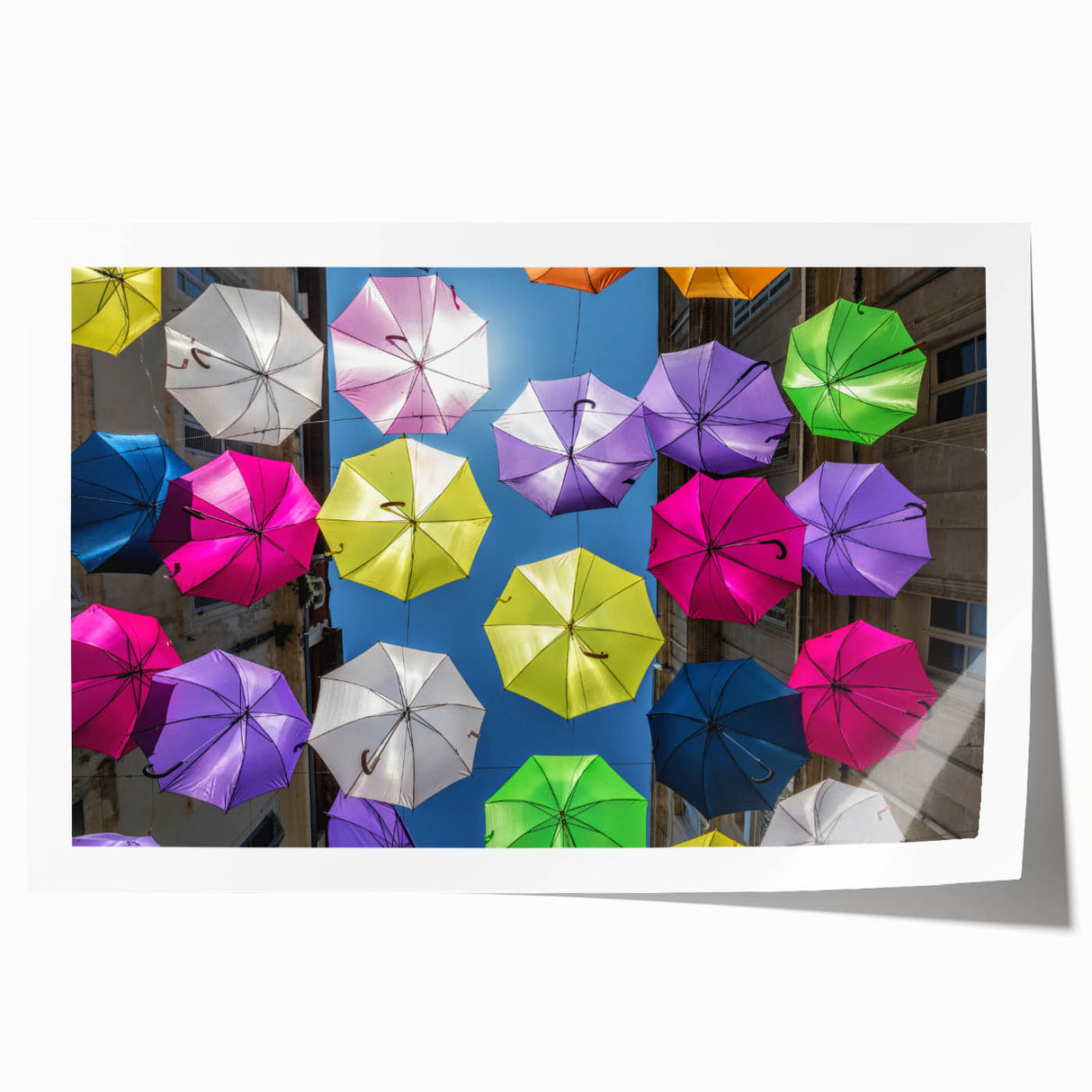 Extra large rolled print of a scenic French village with vibrant floral elements, ideal for dining room wall art.