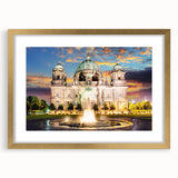 Abstract art print of Berlin cityscape in muted gray and blue tones, framed in gold, ideal for dining room decor.
