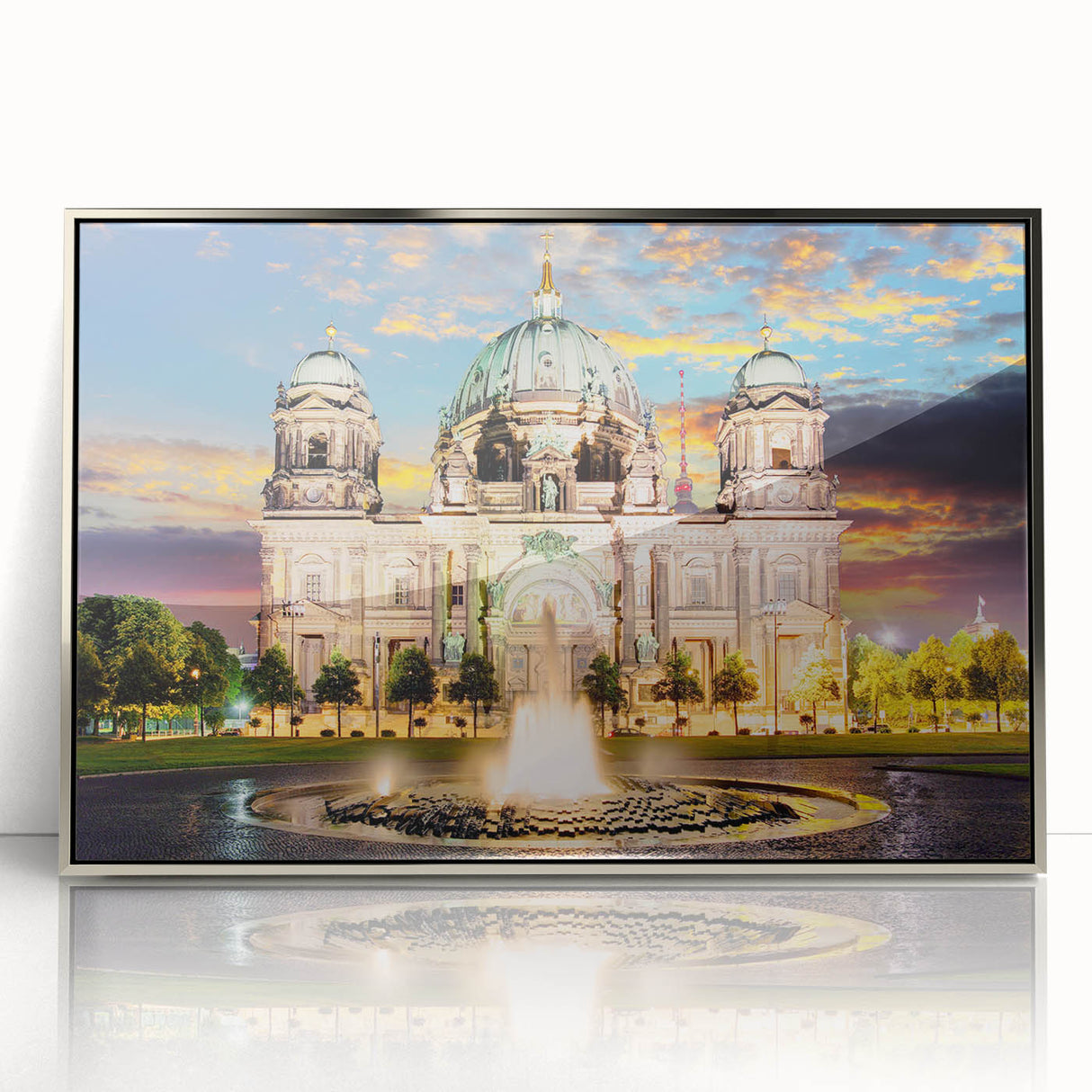 Large art print of Berlin cityscape in muted gray and blue tones on a silver-framed acrylic.