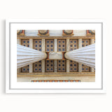 Textured art print of abstract Athens scenery in muted earth tones on a framed white mat, suitable for bedroom decor.