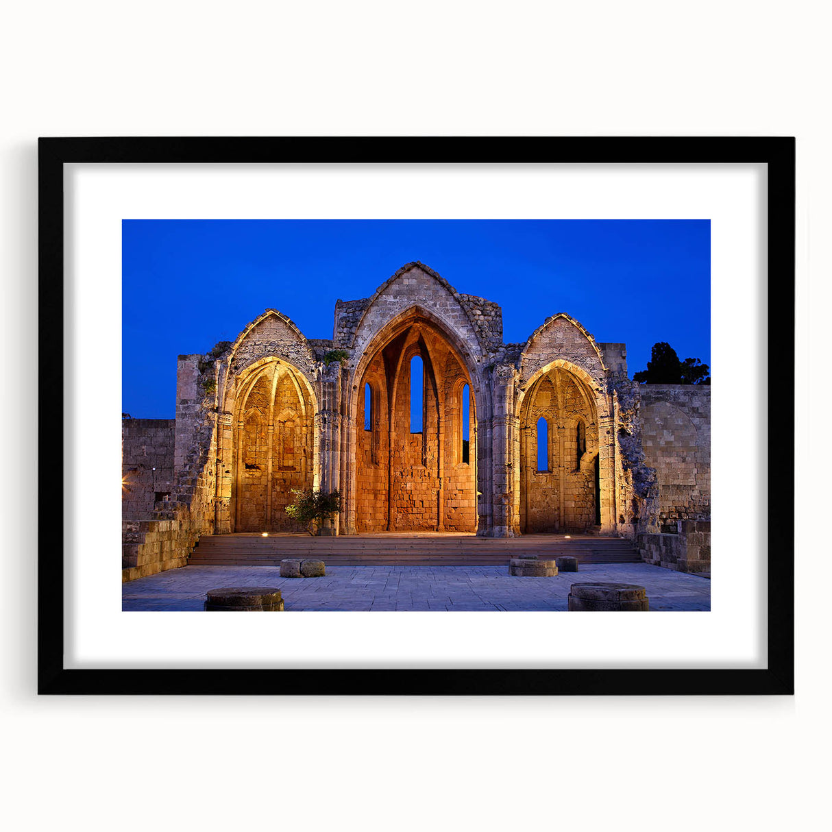 Extra large abstract art print of a colorful European scenery on textured canvas, framed in black.