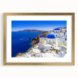 Abstract art print of Santorini with blue and white tones on a framed canvas, ideal for dining room decor.