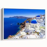 Vintage poster art of Santorini with vibrant blue and white tones on framed canvas, ideal for living room decor.