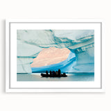 Textured abstract art print depicting a Greenland scenery in muted green and blue tones, framed with a white mat.