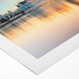 Art Deco poster of a European cityscape in muted beige and brown tones on rolled canvas.