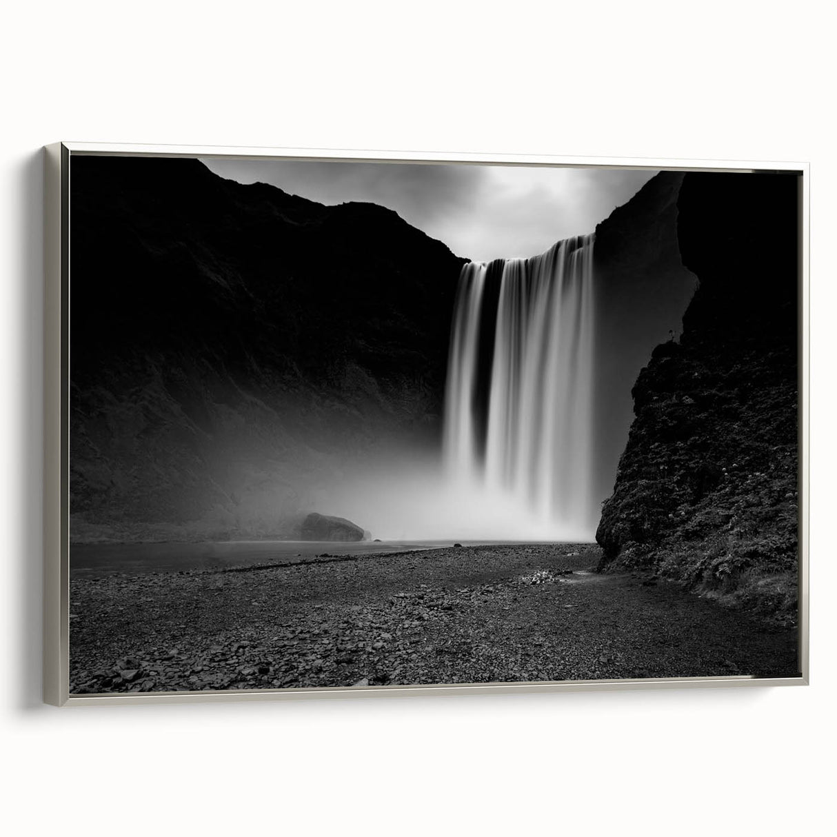 Framed canvas featuring a vintage-style landscape painting of an Icelandic scenery with muted earth tones.