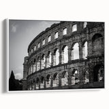 Vintage poster art of the Colosseum in vibrant colors on a large framed canvas, ideal for living room decor.