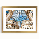 Abstract art print of Milan scenery in muted gold and blue tones on a framed canvas, ideal for dining room décor.