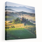 Landscape painting of Tuscany on stretched canvas, featuring rolling hills in muted green and earth tones.