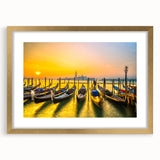 Abstract art print of Venice with muted gold and blue tones on a framed canvas, ideal for dining room decor.