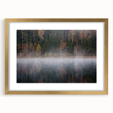 Abstract art print of a European landscape in muted gold and green tones on a framed canvas, suitable for dining room decor.