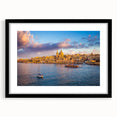 Colorful abstract art print of a European scenery in Malta, displayed in a large black frame with a mat.