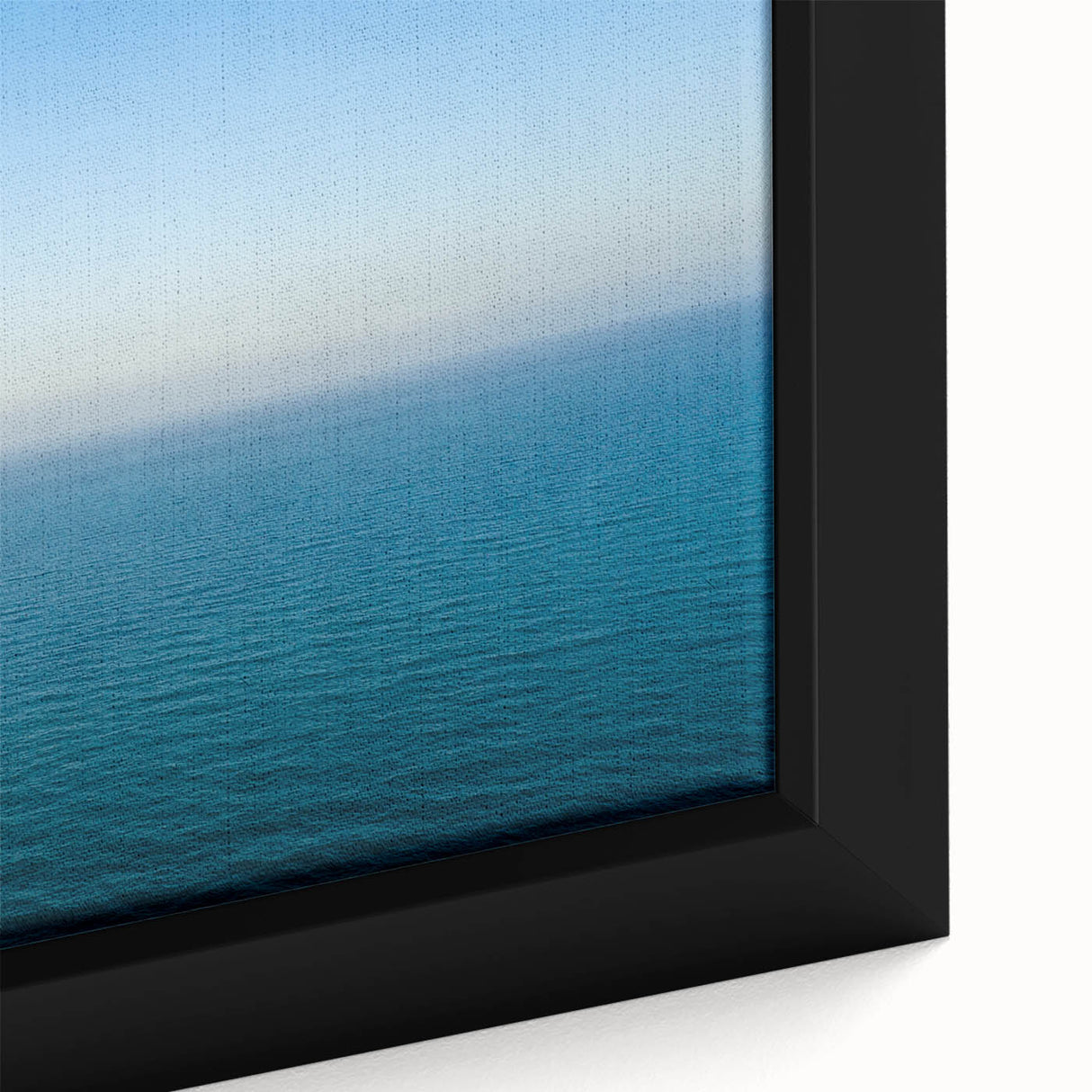Black framed canvas of a textured Mediterranean seascape in vibrant colors, ideal for living room decor.