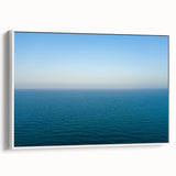 Vintage poster art of the Mediterranean Sea on framed canvas, featuring a colorful palette, ideal for living room decor.