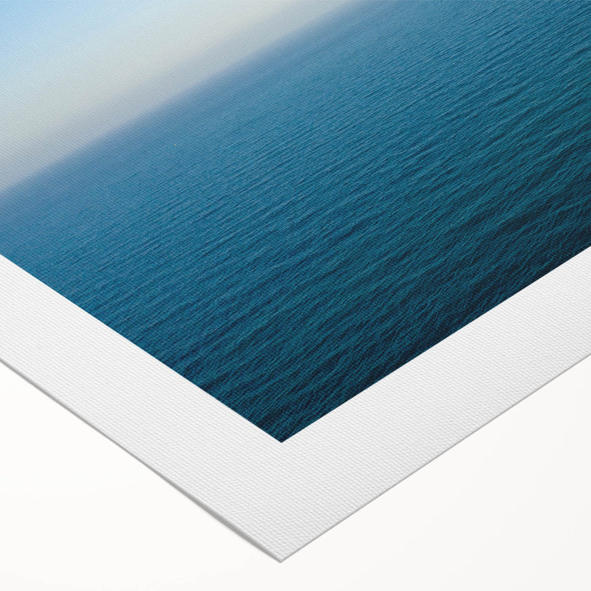 Art deco poster of the Mediterranean Sea in pastel blue and white tones on rolled canvas, suitable for dining room decor.