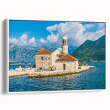 Vintage poster art of a Montenegro scenery on a large framed canvas, featuring vibrant colors against a black background.