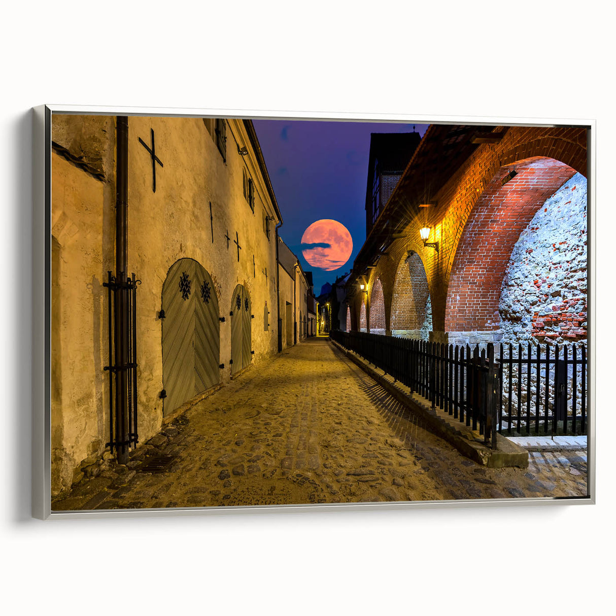Framed canvas of a vintage Amsterdam landscape painting in colorful hues, ideal for living room decor.