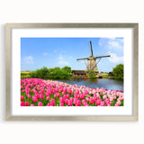 Extra large abstract art print of a European scenery in muted earth tones, framed in silver, suitable for living room decor.