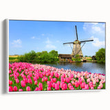Vintage poster art depicting a colorful European scenery on a large framed canvas, suitable for living room decor.