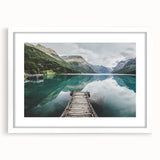 Textured art print of a serene Norwegian landscape in muted earth tones on a framed white mat, suitable for bedroom decor.