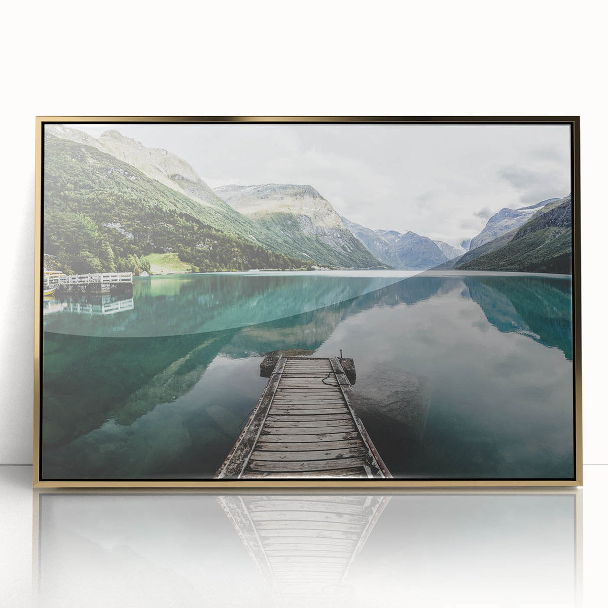 Acrylic print of a serene Norwegian landscape in muted blue and green tones, framed in gold.