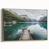 Framed canvas featuring a vintage-style landscape painting of a Norwegian scenery in muted gold and black tones.